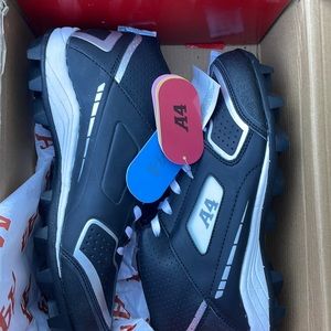 A4 Football cleats black and white size 6.5 Youth